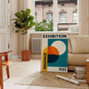 Bauhaus exhibition poster featuring geometric abstract design in blue and green
