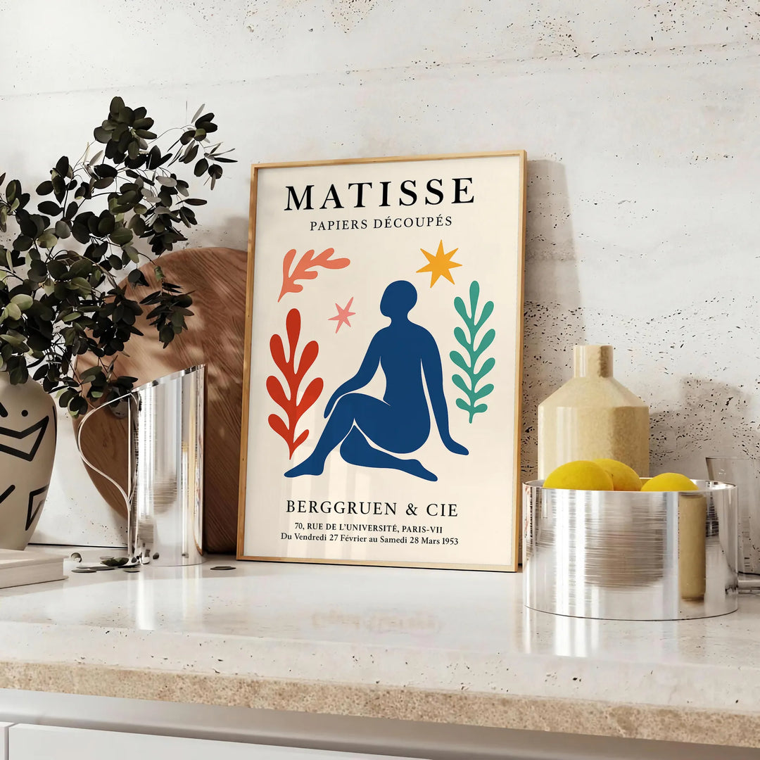 Abstract composition of cut-out shapes in white and orange by Matisse