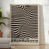 Minimalist poster featuring black lines on a gray background, inspired by Bauhaus design