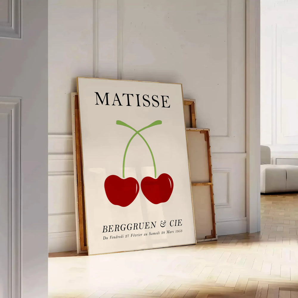 Red and orange paper-cut cherries in a mid-century style