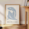Abstract silhouette of a reclining nude in blue and white