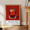 Illustration of a Negroni cocktail with orange and red splashes