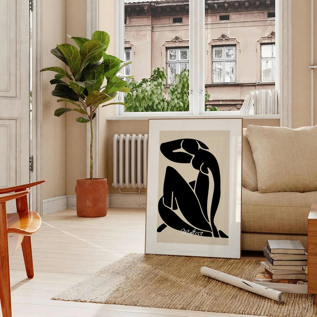 abstract blue nude figure in cut-out style with white and gray accents