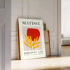 Poster showing Matisse Papiers Découpés style white and orange abstract composition