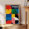 Bauhaus poster featuring blue and red geometric shapes in minimalist style