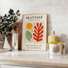 Poster con opera di Matisse in stile ritagli, forme verdi e arancioni