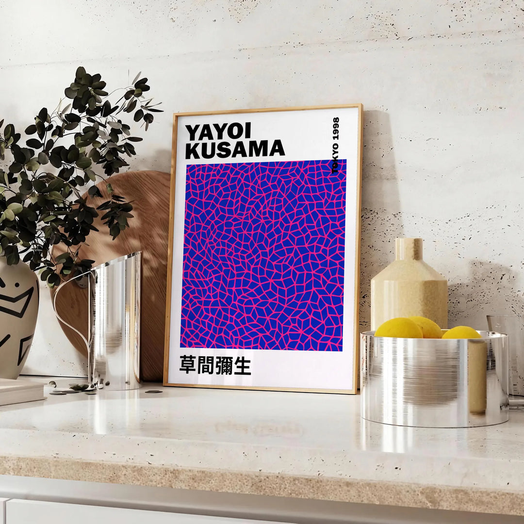 Pink and black pumpkin design by Yayoi Kusama in pop-art style