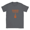 T-shirt featuring a graphic of tennis rackets and a ball with Paris landmarks