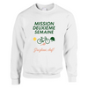 Sweater featuring a graphic print of tennis elements and the text Mission 2ème Semaine