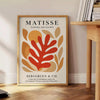 Forme ritagliate astratte in nero e arancione di Matisse