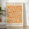 Intricate floral pattern in orange and brown by William Morris