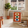 Bauhaus poster featuring stylized eyes in bold orange and green