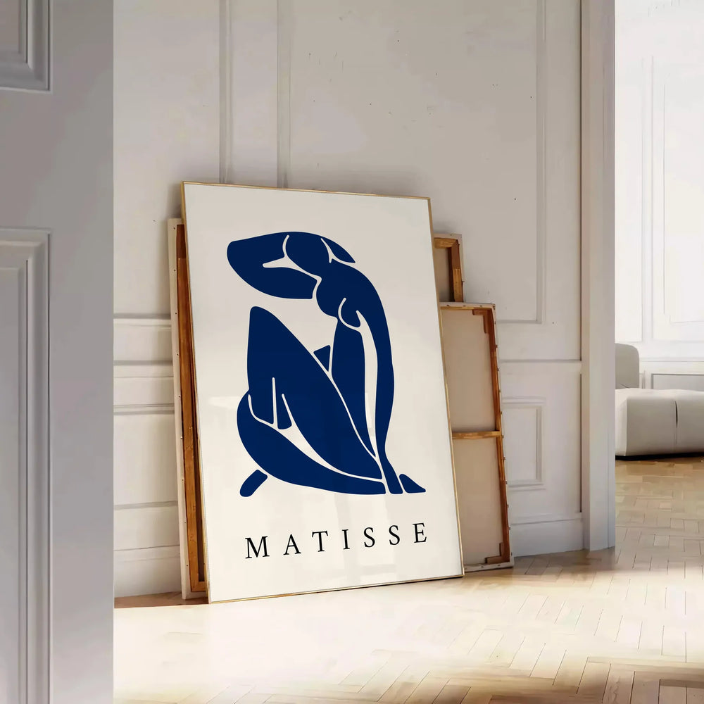 Abstract blue figure on a white and gray background in Matisse's Blue Nude II