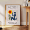 Wycięta praca kobiety autorstwa Matisse'a w bieli i pomarańczy