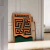 Bauhaus labyrinth poster with geometric maze design in green and gray