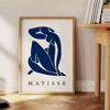 Abstract blue figure on a white and gray background in Matisse's Blue Nude II