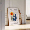Wycięta praca kobiety autorstwa Matisse'a w bieli i pomarańczy