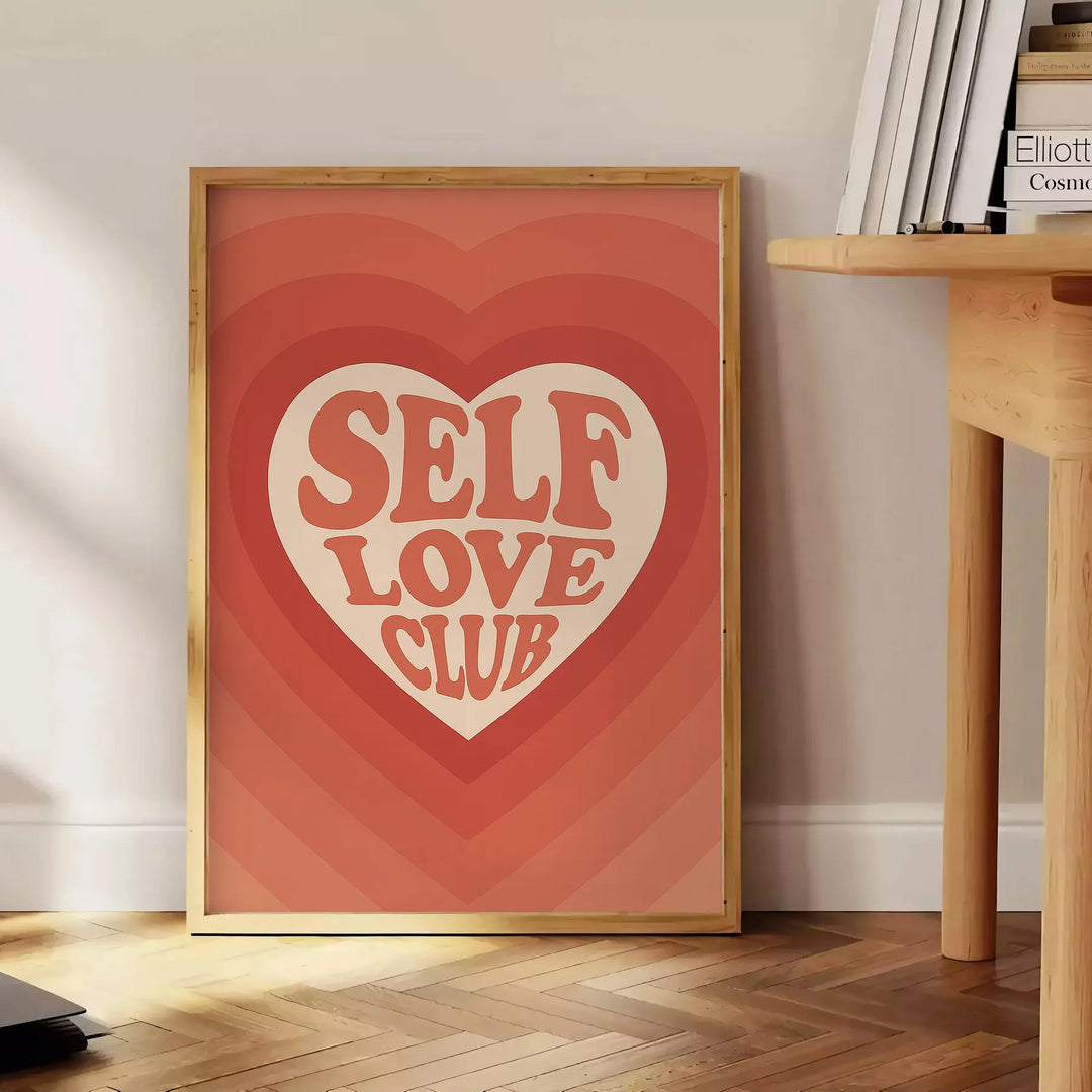 A motivational poster featuring the phrase 'Self Love Club' in bold typography, with energetic orange and red hues.