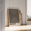 Bauhaus pyramid poster in brown, gray, and green geometric design