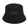 Cap featuring an embroidered graphic of tennis elements inspired by Paris