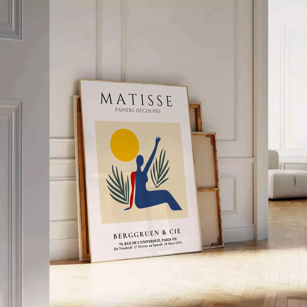 Poster showing Matisse paper-cut woman in orange and red tones