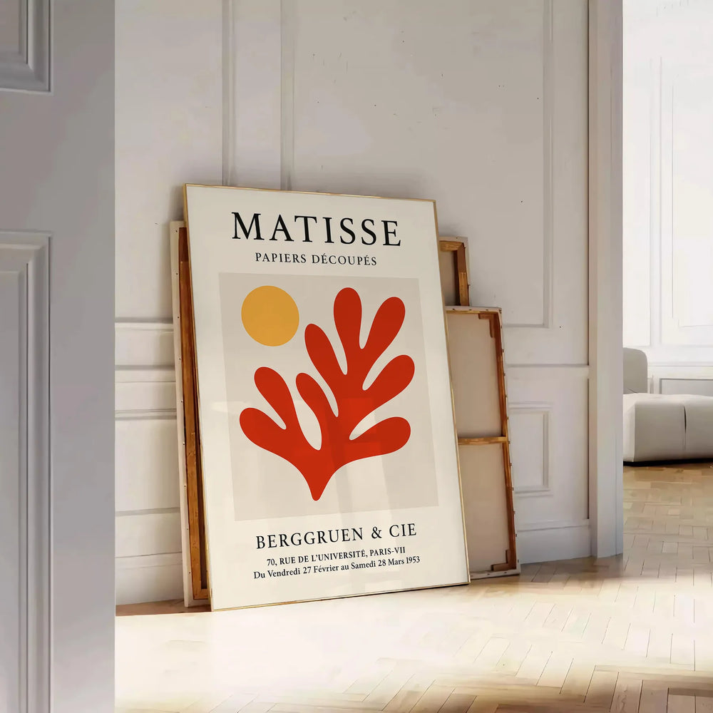 Cut-paper composition by Matisse featuring bold black and orange shapes
