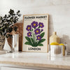 Poster showing London flower market botanical illustration in green and gray