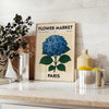 Vintage illustration of a botanical flower market in Paris with blue and gray tones