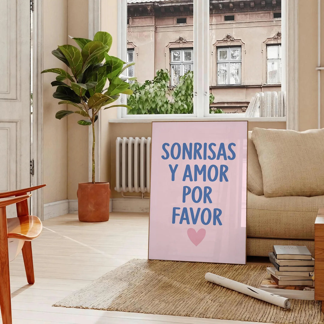 Affiche blanche avec typographie verte portant la phrase 'Sonrisas y Amor Por Favor'