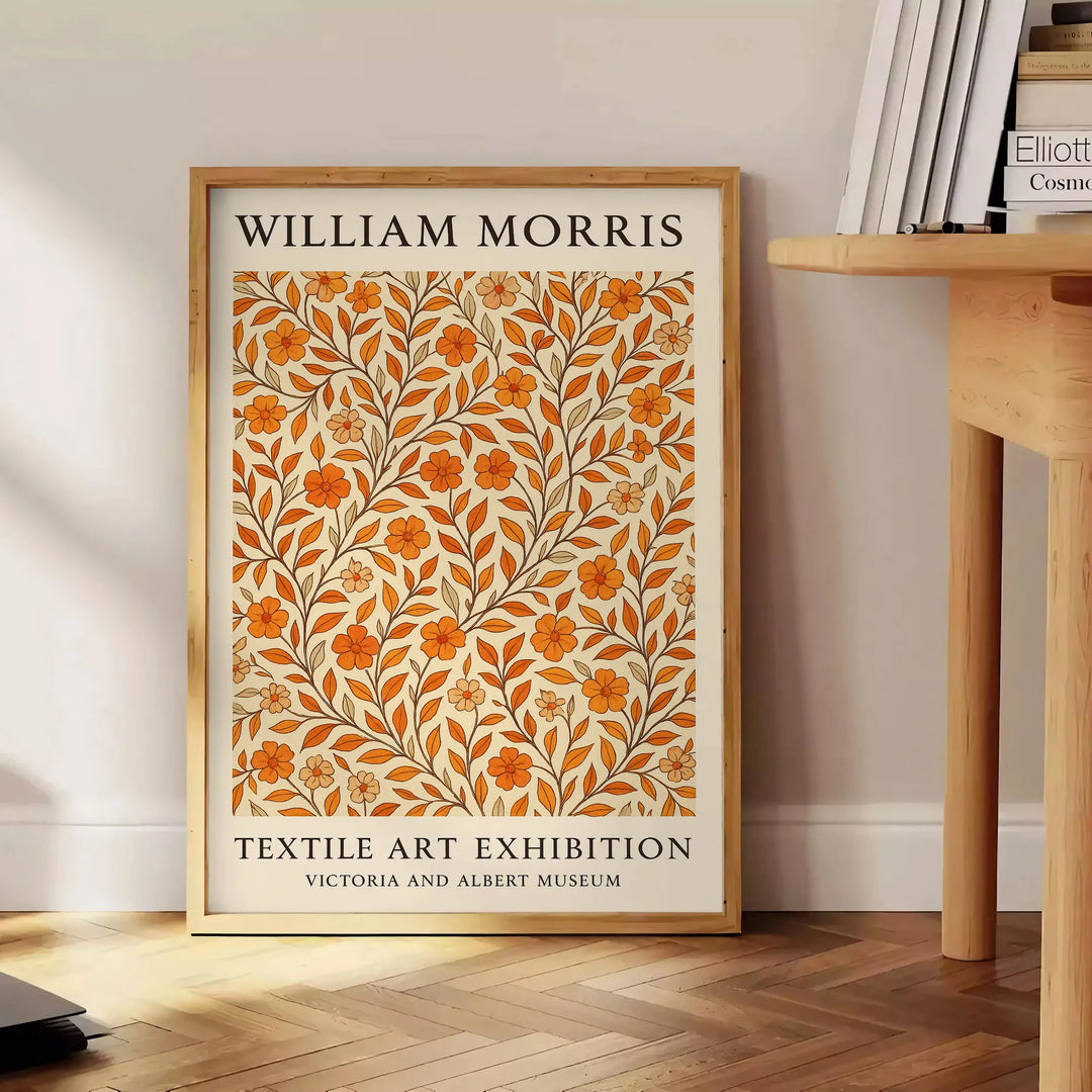 Intricate floral pattern in orange and brown by William Morris