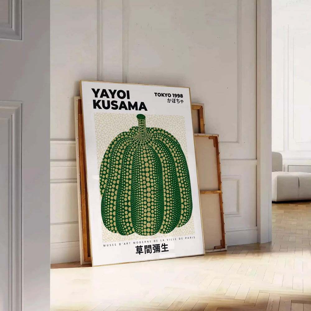 Green and white polka-dotted pumpkin by Yayoi Kusama