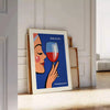 Vintage cocktail poster showing wine glass illustration in orange and red