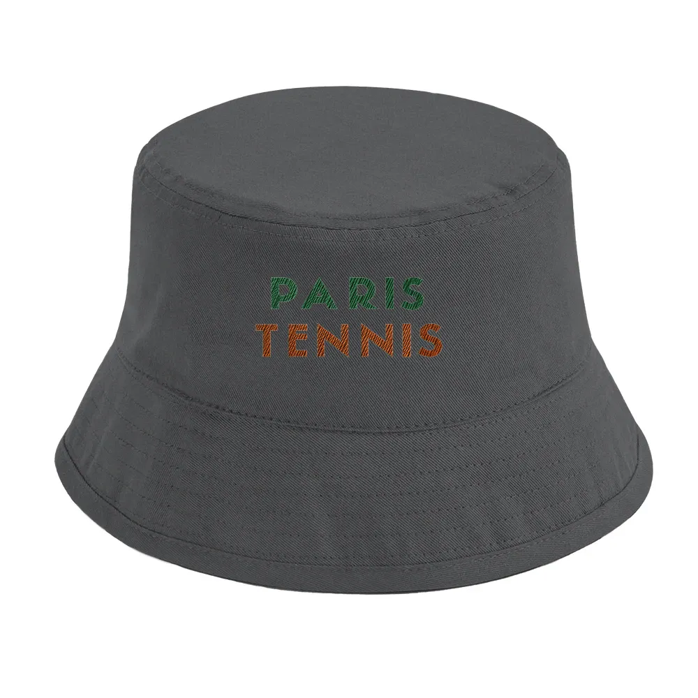 Cap featuring an embroidered graphic of tennis elements inspired by Paris