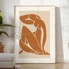 Matisse's Blue Nude II featuring cutout shapes in blue, white, and brown