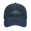 Embroidered cap featuring a vintage tennis design with Normandie text