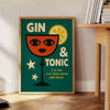 A gin and tonic cocktail with orange zest and green garnishes