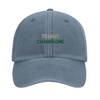 Cap featuring an embroidered vintage tennis design with champagne elements