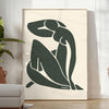 Matisse-style blue cutout figure on a white-gray background