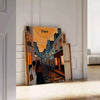 Montmartre poster with stylized illustration of Paris in green and orange