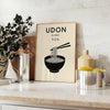 Stylized udon noodle bowl with chopsticks, orange and black graphic art