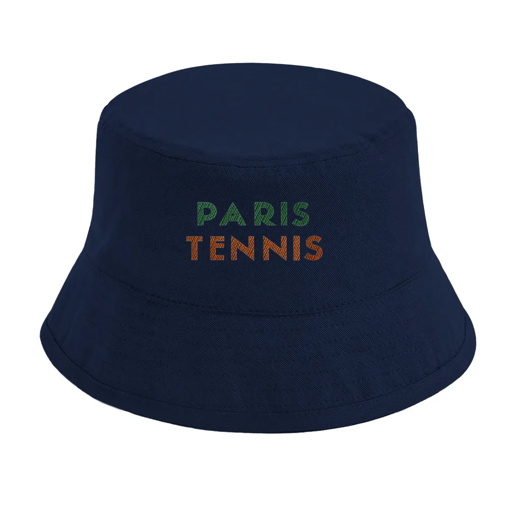 Cap featuring an embroidered graphic of tennis elements inspired by Paris