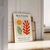 Poster con opera di Matisse in stile ritagli, forme verdi e arancioni