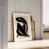 abstract blue nude figure in cut-out style with white and gray accents