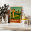 Vintage Chantilly golf poster with green and orange travel-style illustration