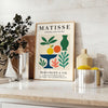 Plakat mit Matisse Scherenschnitt-Kunst in Weiß und Orange