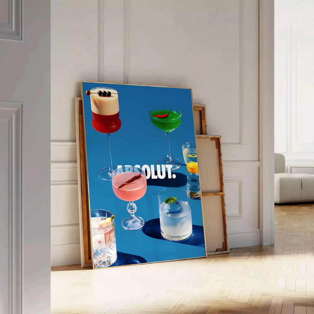 Poster of Absolut cocktail artwork in black and brown minimalist style - leaning on a herringbone floor against a white panelled wall