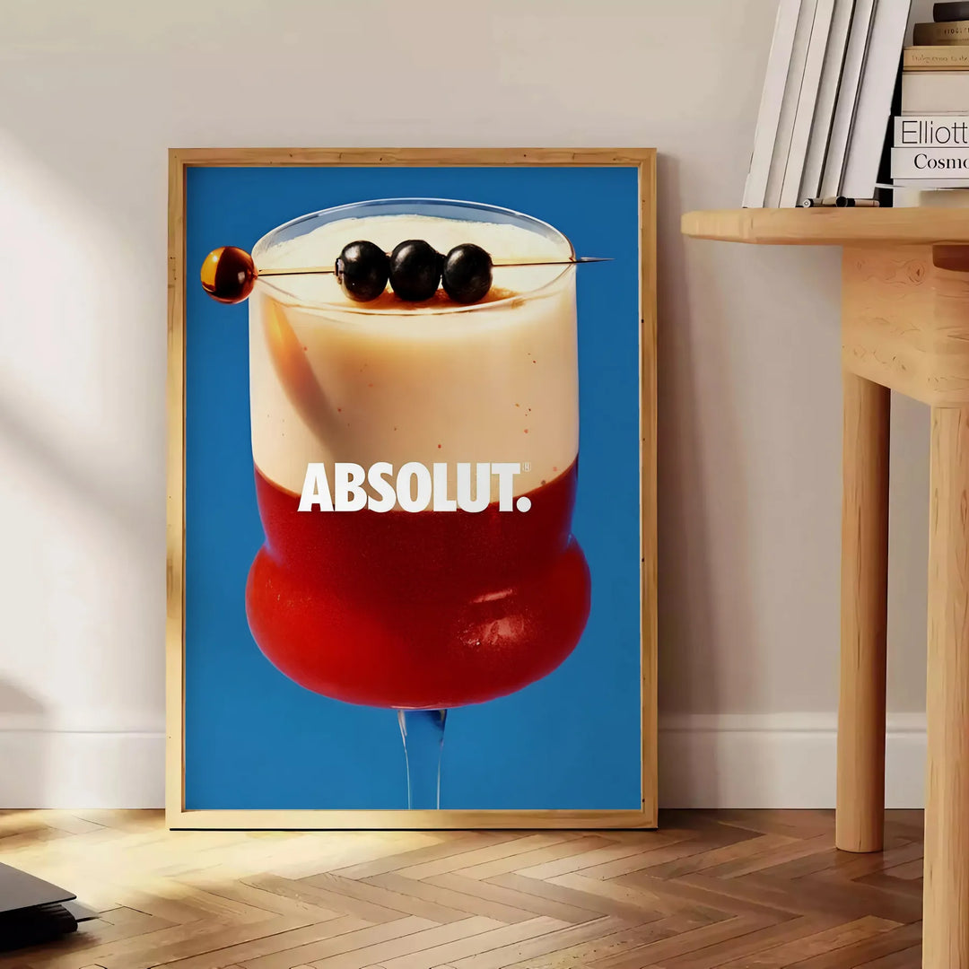 Vintage cocktail illustration featuring brown and blue tones - beside a round wooden side table with books