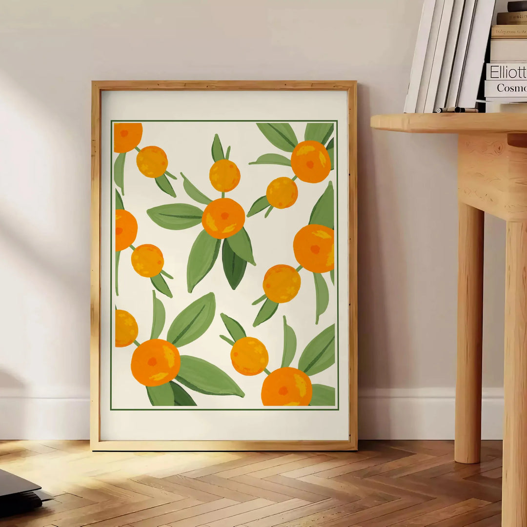 Green and white citrus kitchen poster, minimalist watercolor-style artwork - beside a round wooden side table with books