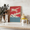 Retro illustration of vintage airplanes in gray and orange tones - styled on a counter with eucalyptus and a bowl of lemons