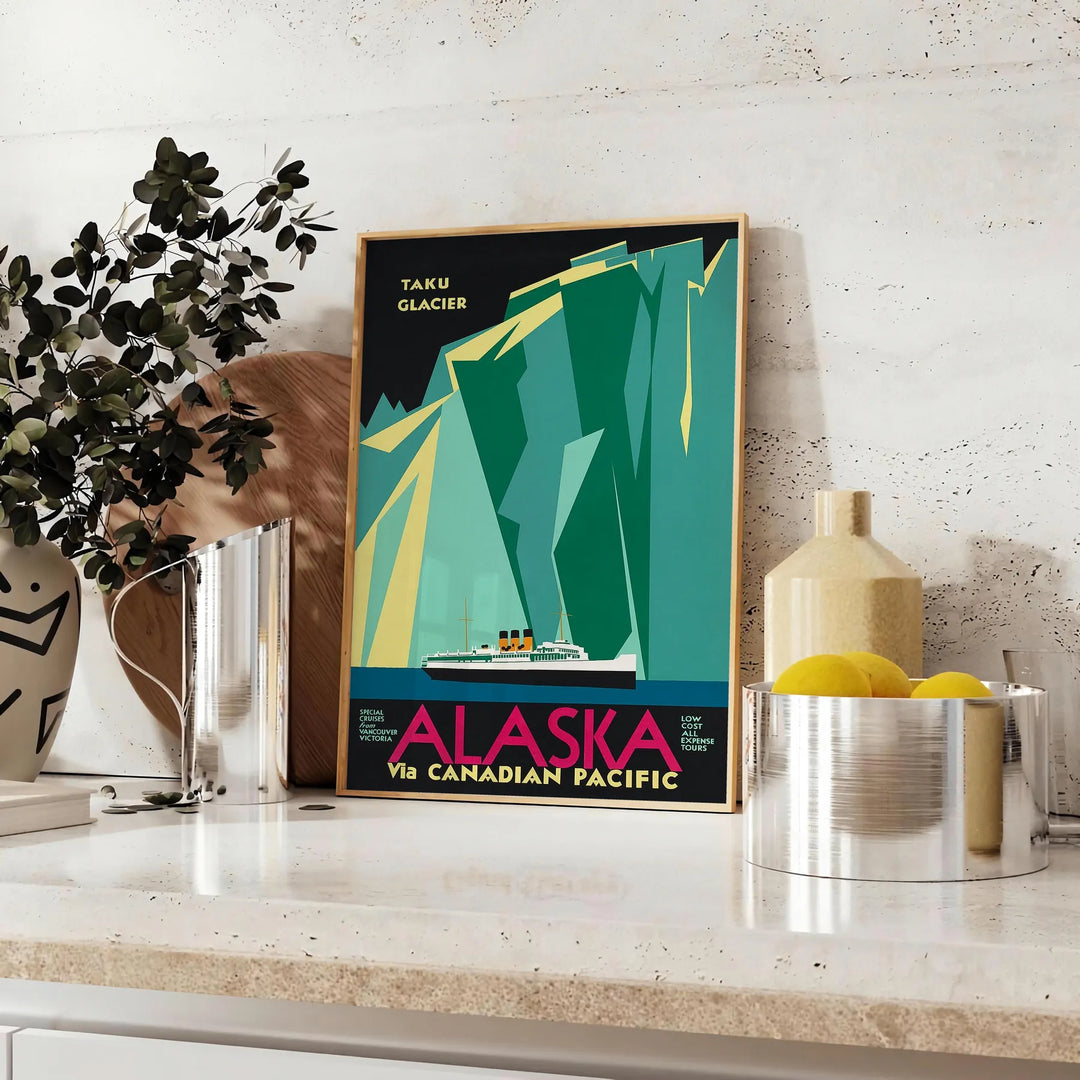 Stylized mountains and forest in shades of green and blue - styled on a counter with eucalyptus and a bowl of lemons
